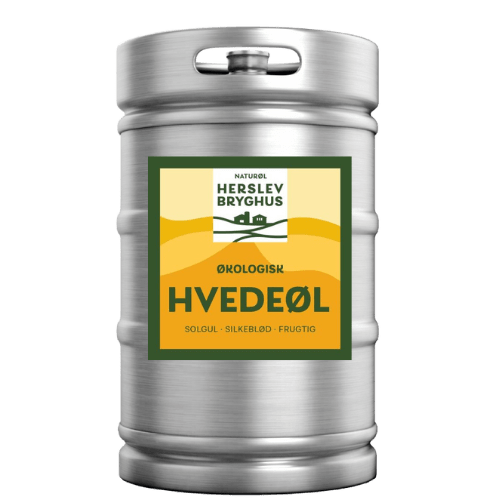 Eight shirts arranged on table in black, olive, grey, blue, white, red, mustard, and green.