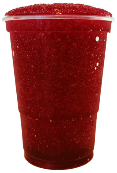 Eight shirts arranged on table in black, olive, grey, blue, white, red, mustard, and green.