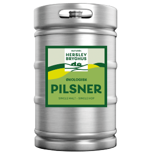 Eight shirts arranged on table in black, olive, grey, blue, white, red, mustard, and green.